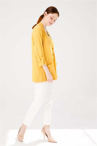 Женская куртка горчичного цвета