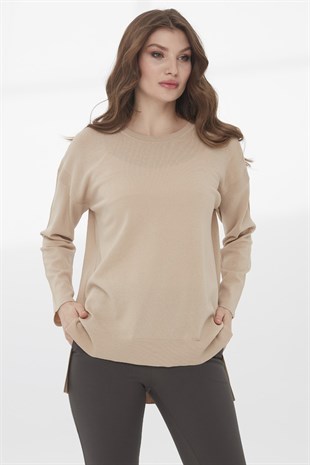 Женская трикотажная лентяя блуза бежевого цвета