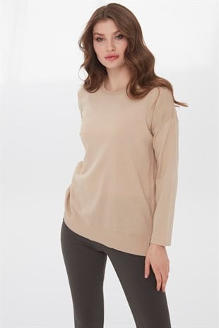 Женская трикотажная лентяя блуза бежевого цвета