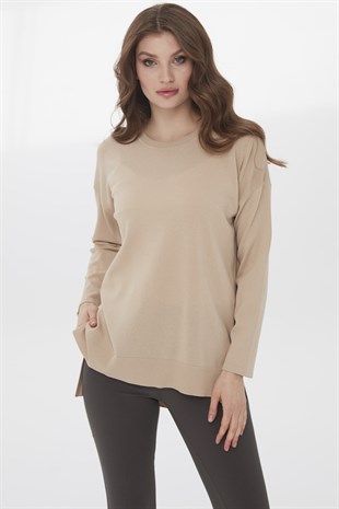 Женская трикотажная лентяя блуза бежевого цвета