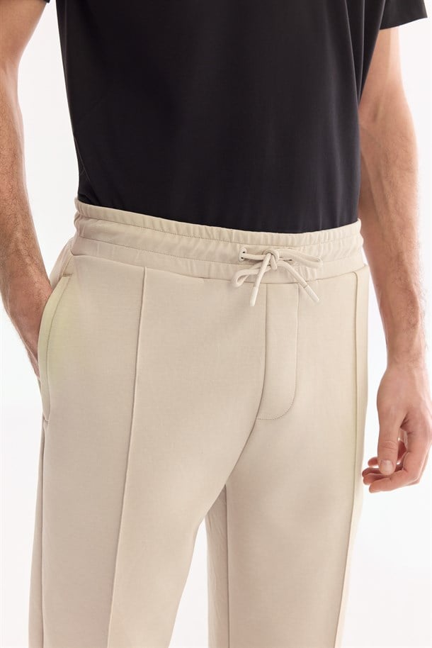 Bej Beli Lastikli Bağcıklı Yandan Cep Fermuar  Nervürlü İnterlok Jogger