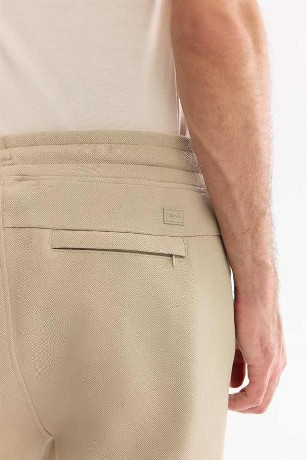 Bej Beli Lastikli Yandan Cepli Nervürlü Pike İnterlok Şort