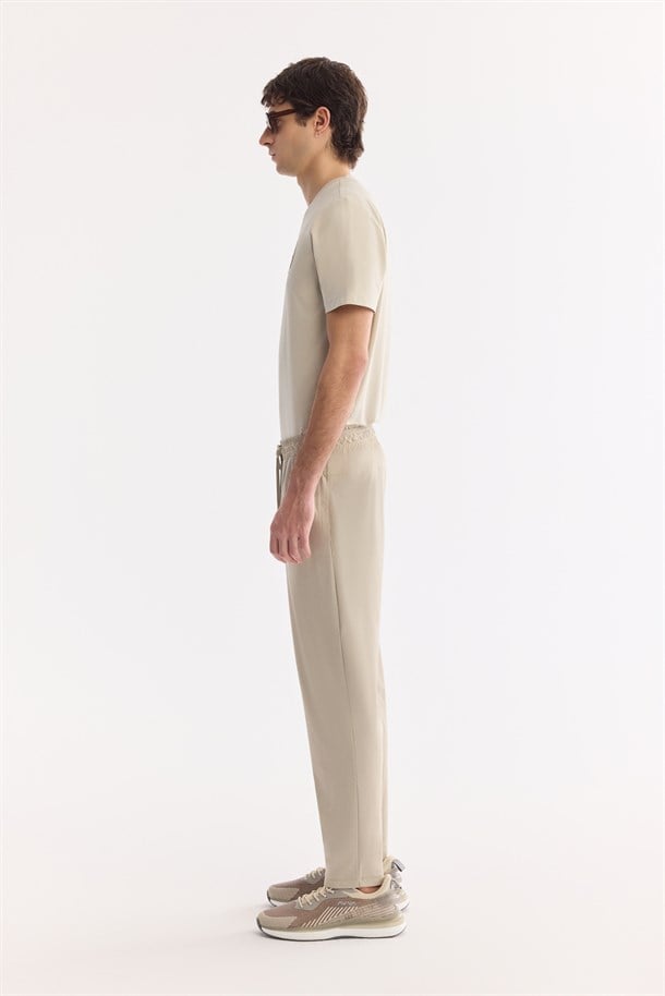 Bej Beli Lastikli Kırışmaz Hızlı Kuruyan Teknik Kumaş Eşofman Altı