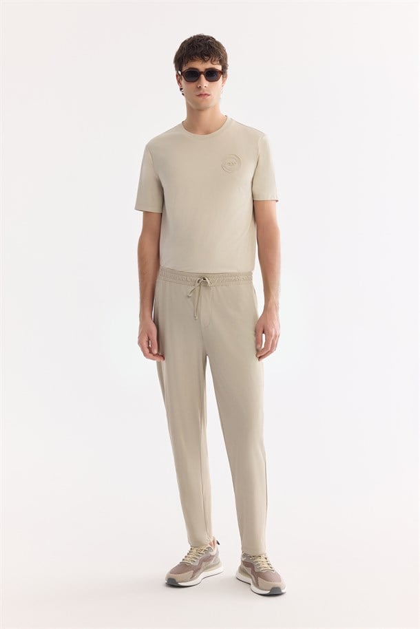 Bej Beli Lastikli Kırışmaz Hızlı Kuruyan Teknik Kumaş Eşofman Altı