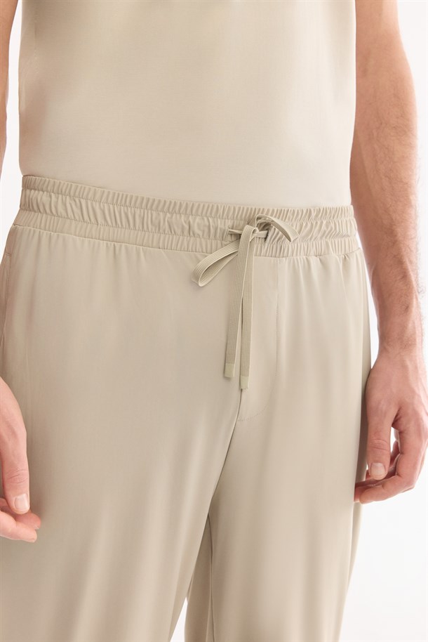 Bej Beli Lastikli Kırışmaz Hızlı Kuruyan Teknik Kumaş Eşofman Altı