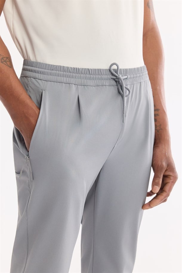 Gri Beli Lastikli Bi-Stretch Hızlı Kuruyan Teknik Kumaş Jogger Pantolon