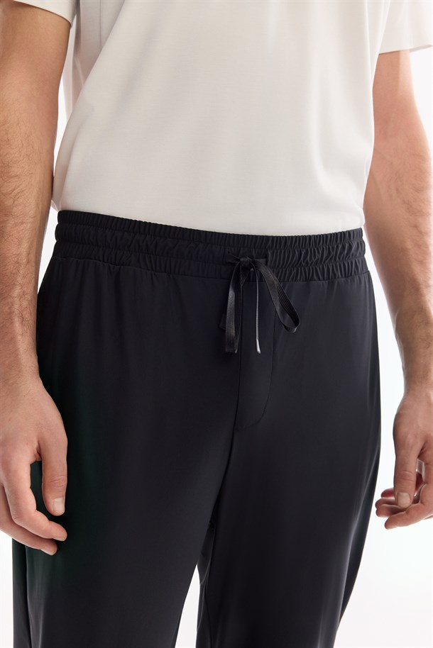 Siyah Beli Lastikli Kırışmaz Hızlı Kuruyan Teknik Kumaş Eşofman Altı