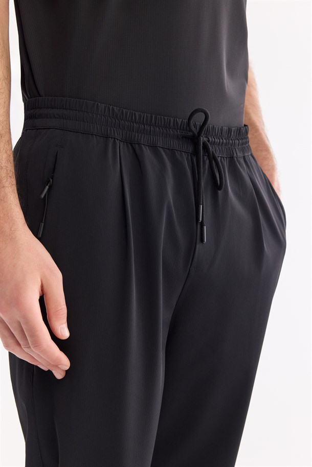 Siyah Beli Lastikli Bi-Stretch Hızlı Kuruyan Teknik Kumaş Jogger Pantolon