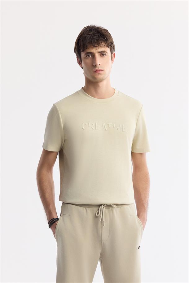Bej Beli Lastikli Bağcıklı Yandan Cepli Flexi Baskı Detaylı Soft Touch  Örme Şort
