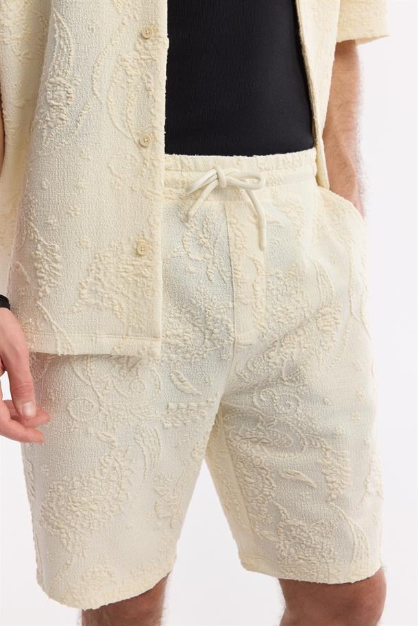 Ekru Beli Lastikli Bağcıklı Yandan Cepli Jakarlı Örme Şort