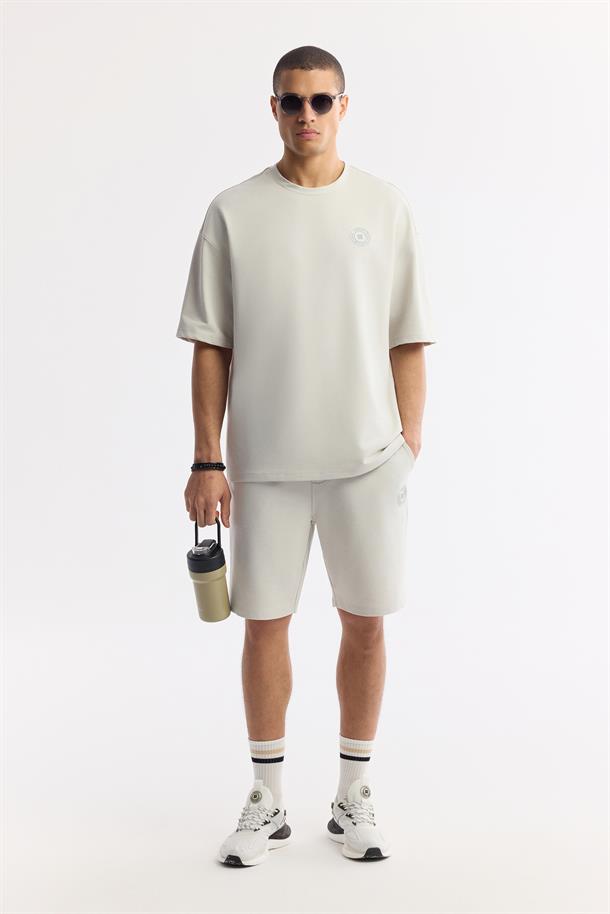 Taş Bisiklet Yaka Oversize Aplike Baskı Detaylı 2'İplik T-Shirt