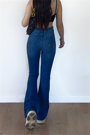 ASİMETRİK KOYU DİZİ YIRTIK JEAN