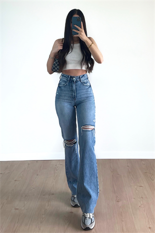 ASİMETRİK YIRTIK AÇIK MAVİ JEANS