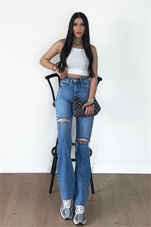 ASİMETRİK YIRTIK AÇIK MAVİ JEANS