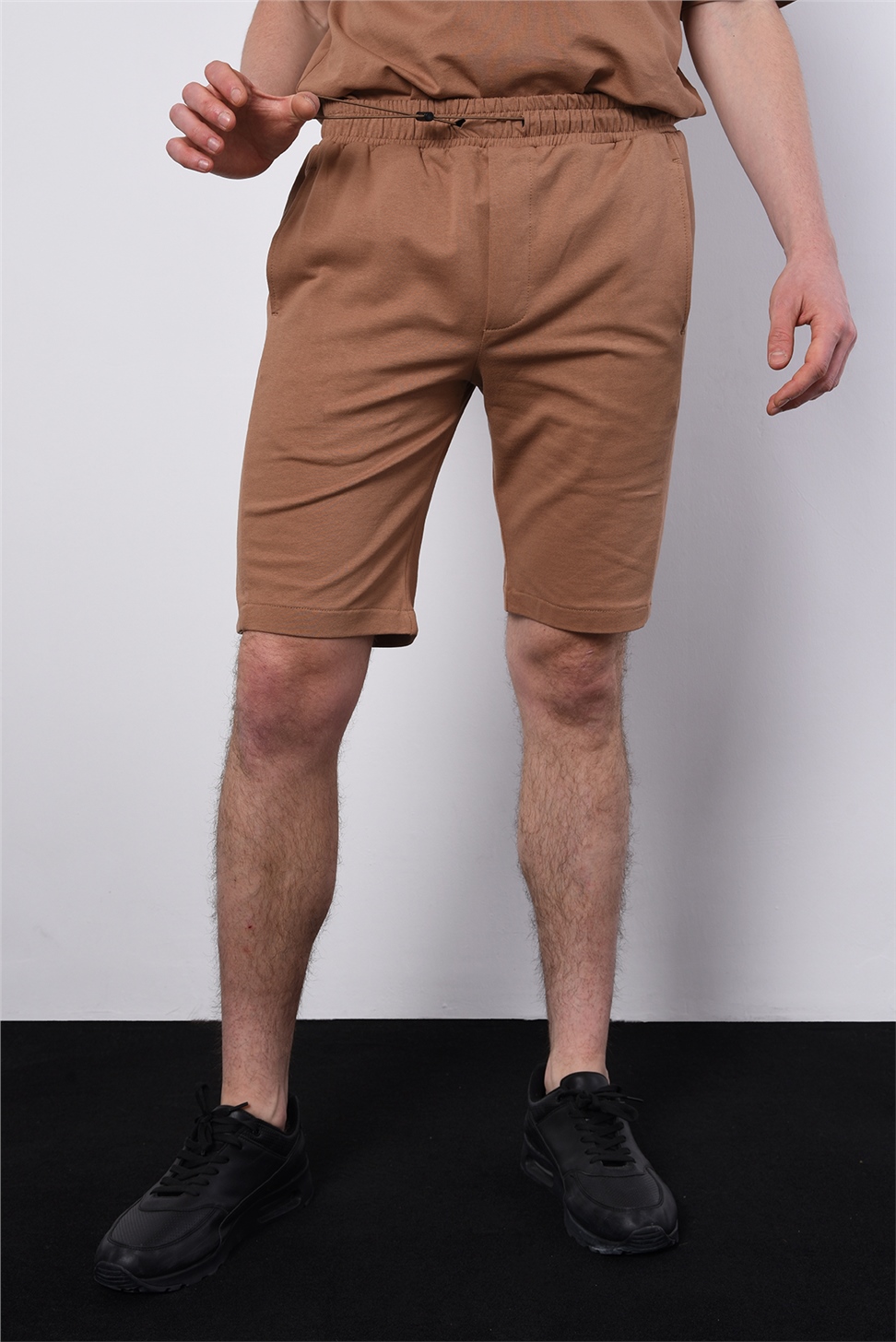 طقم تي شيرت رجالي كبير الحجم + شورت بأزرار جانبية