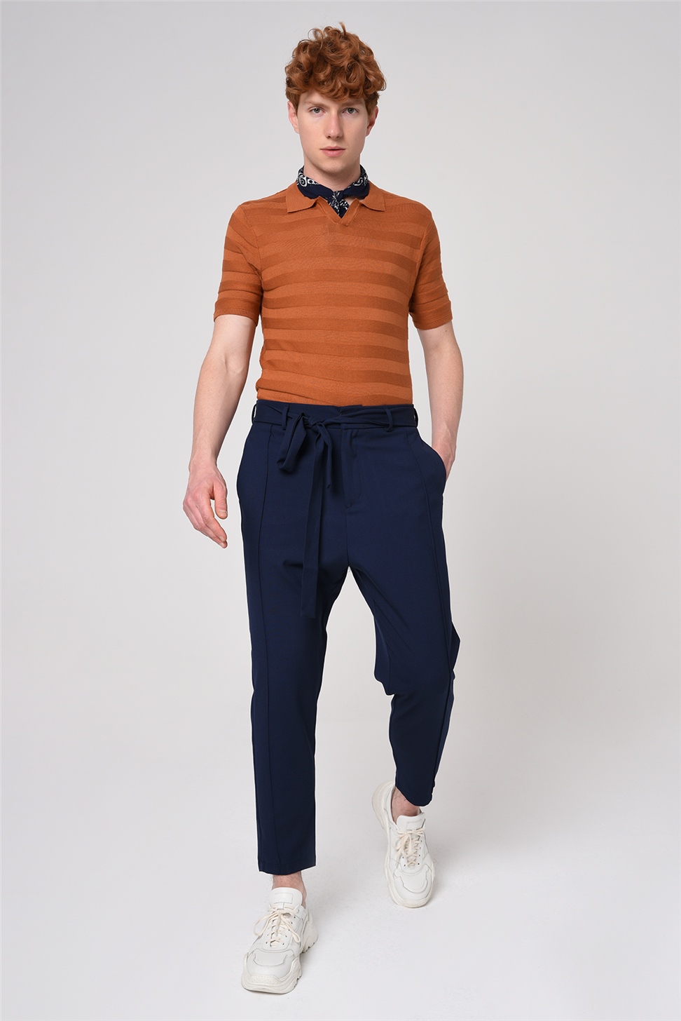 تي شيرت تريكو منقوش بياقة بولو مخططة