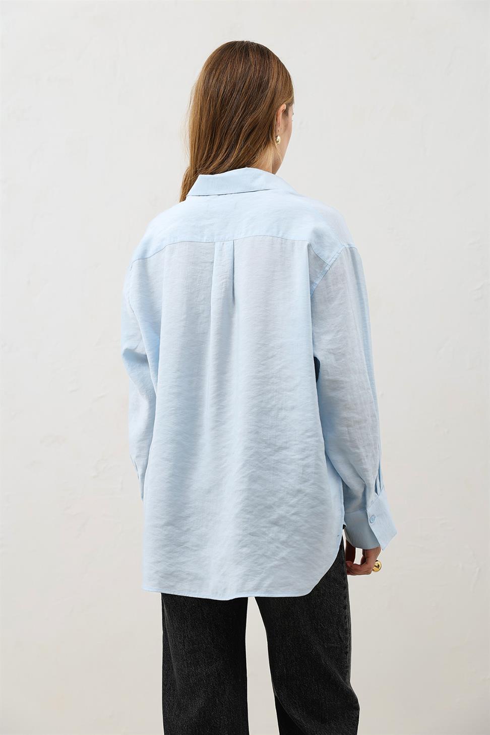 قميص نسائي كبير الحجم