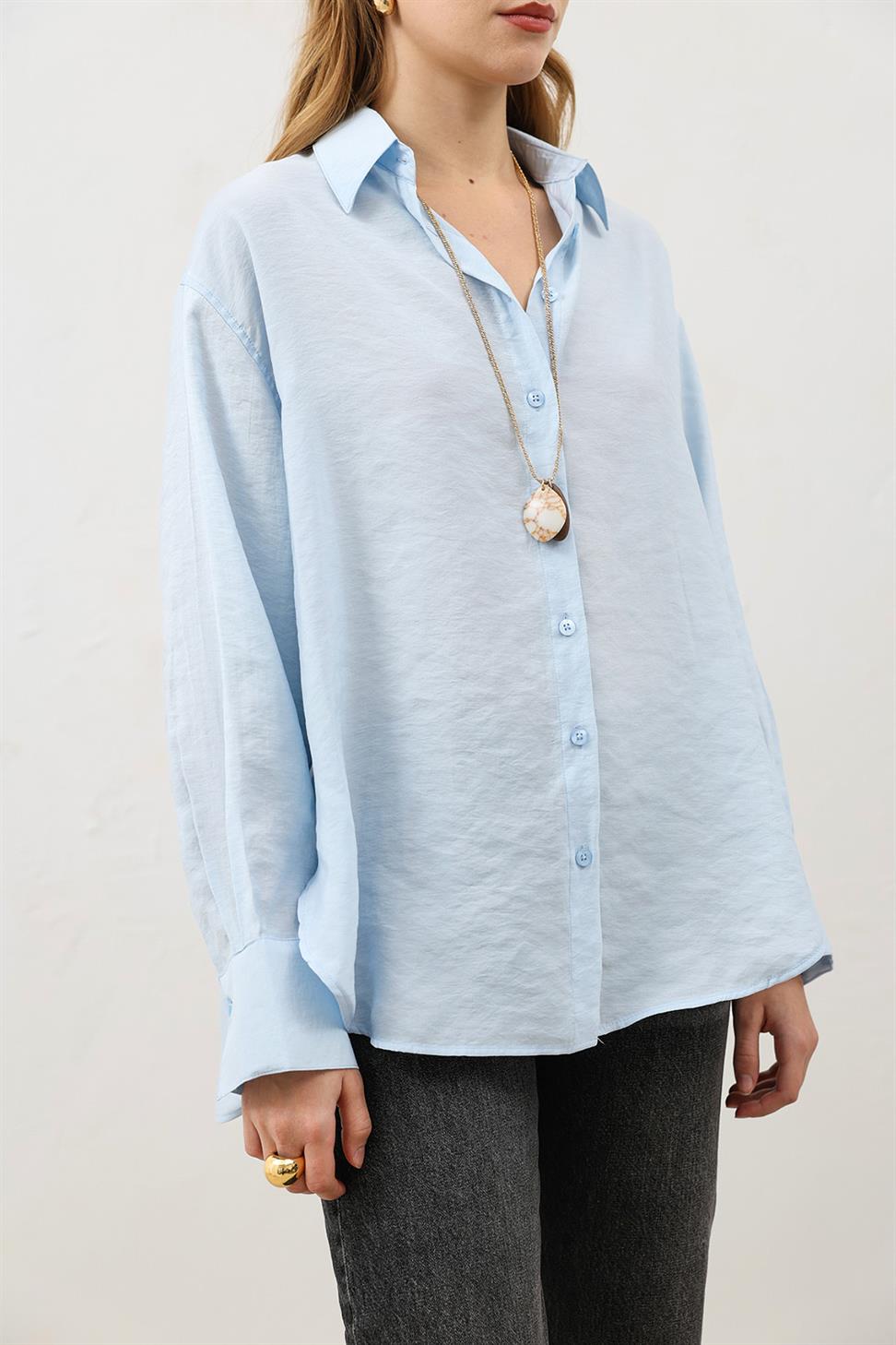 قميص نسائي كبير الحجم