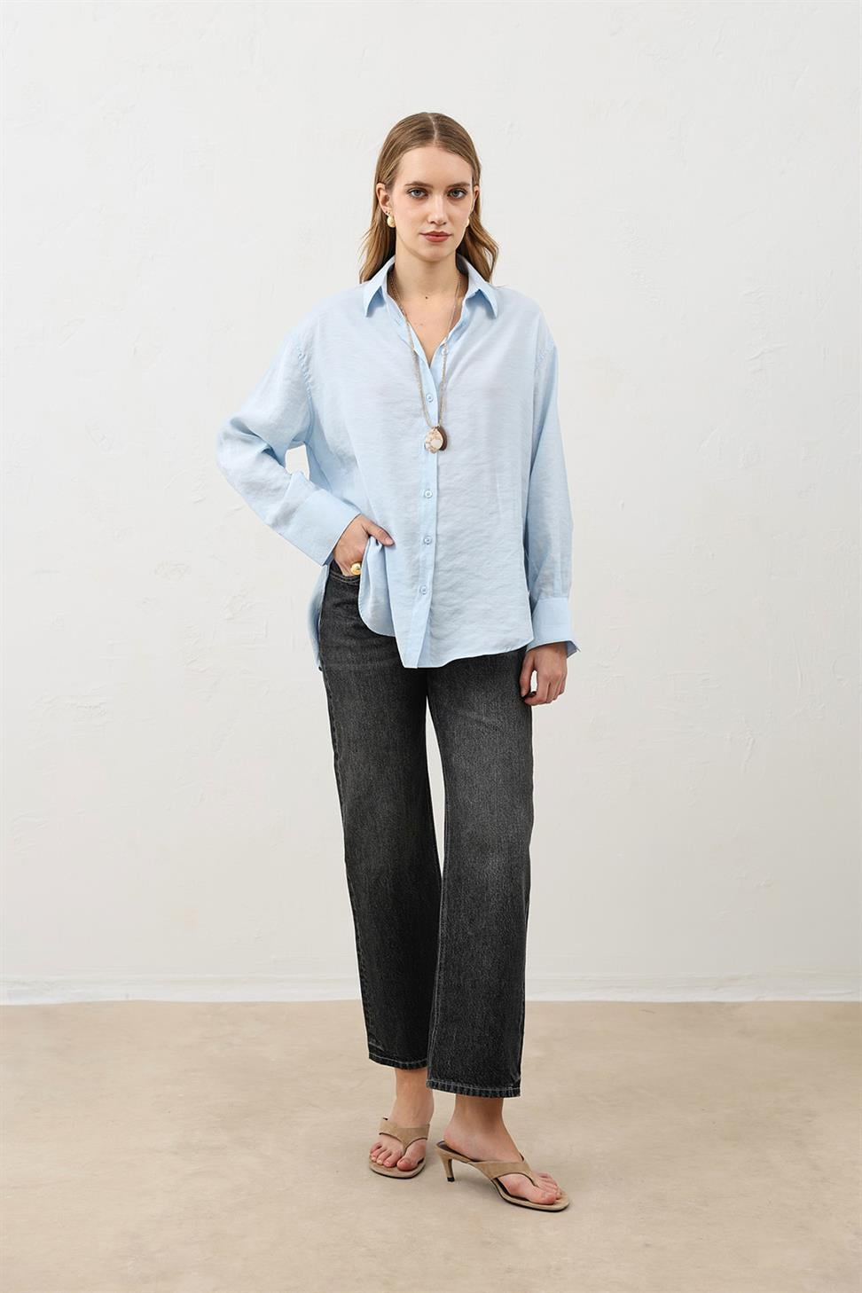 قميص نسائي كبير الحجم