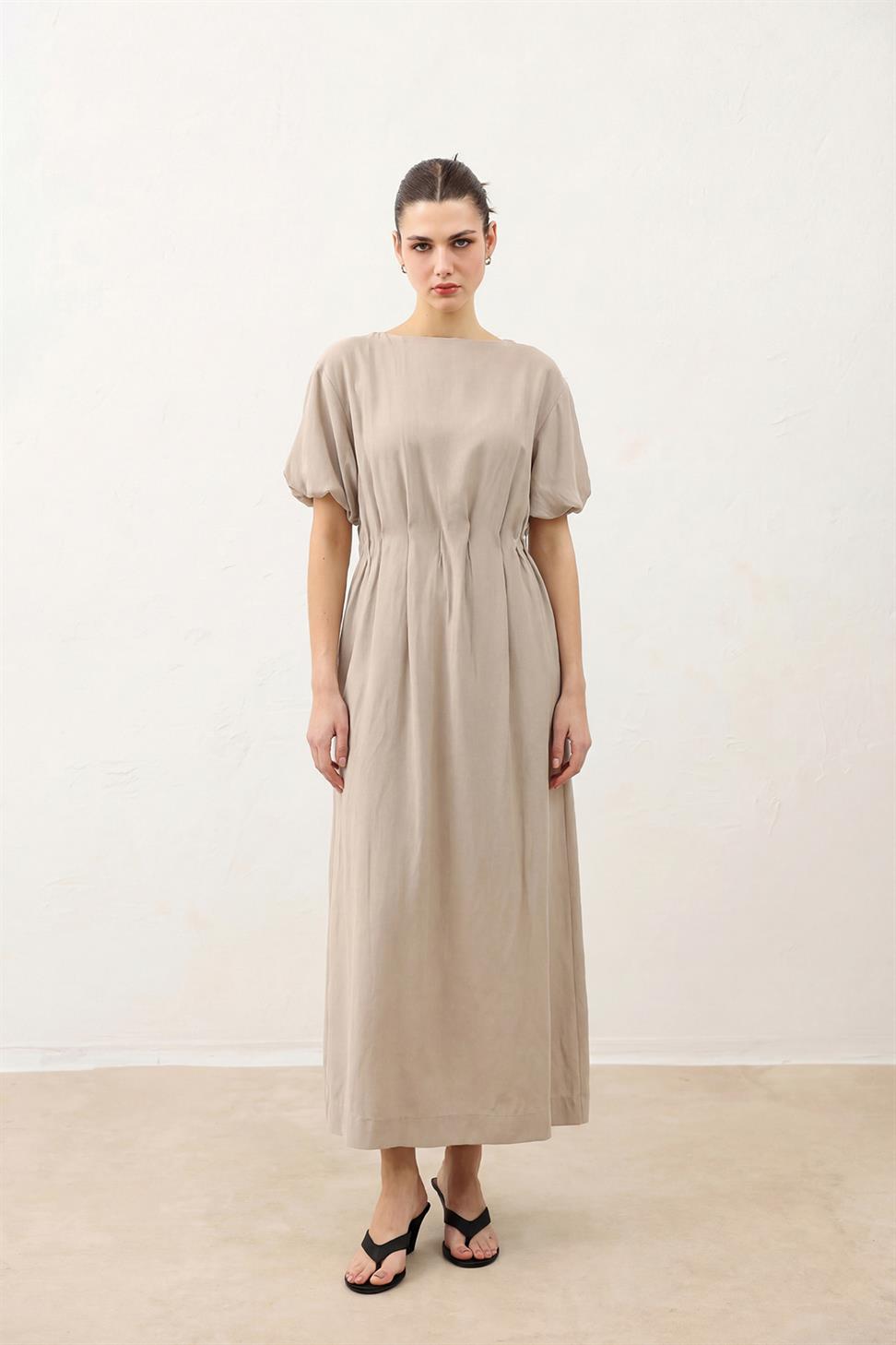 فستان نسائي بأكمام بالون بطول متوسط