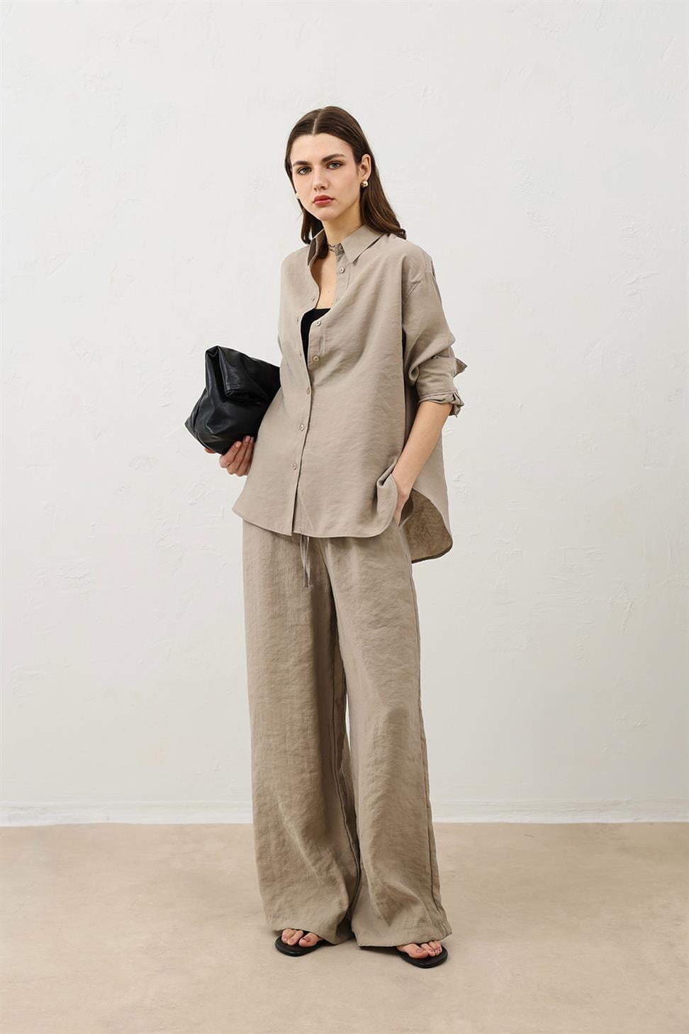 قميص نسائي كبير الحجم