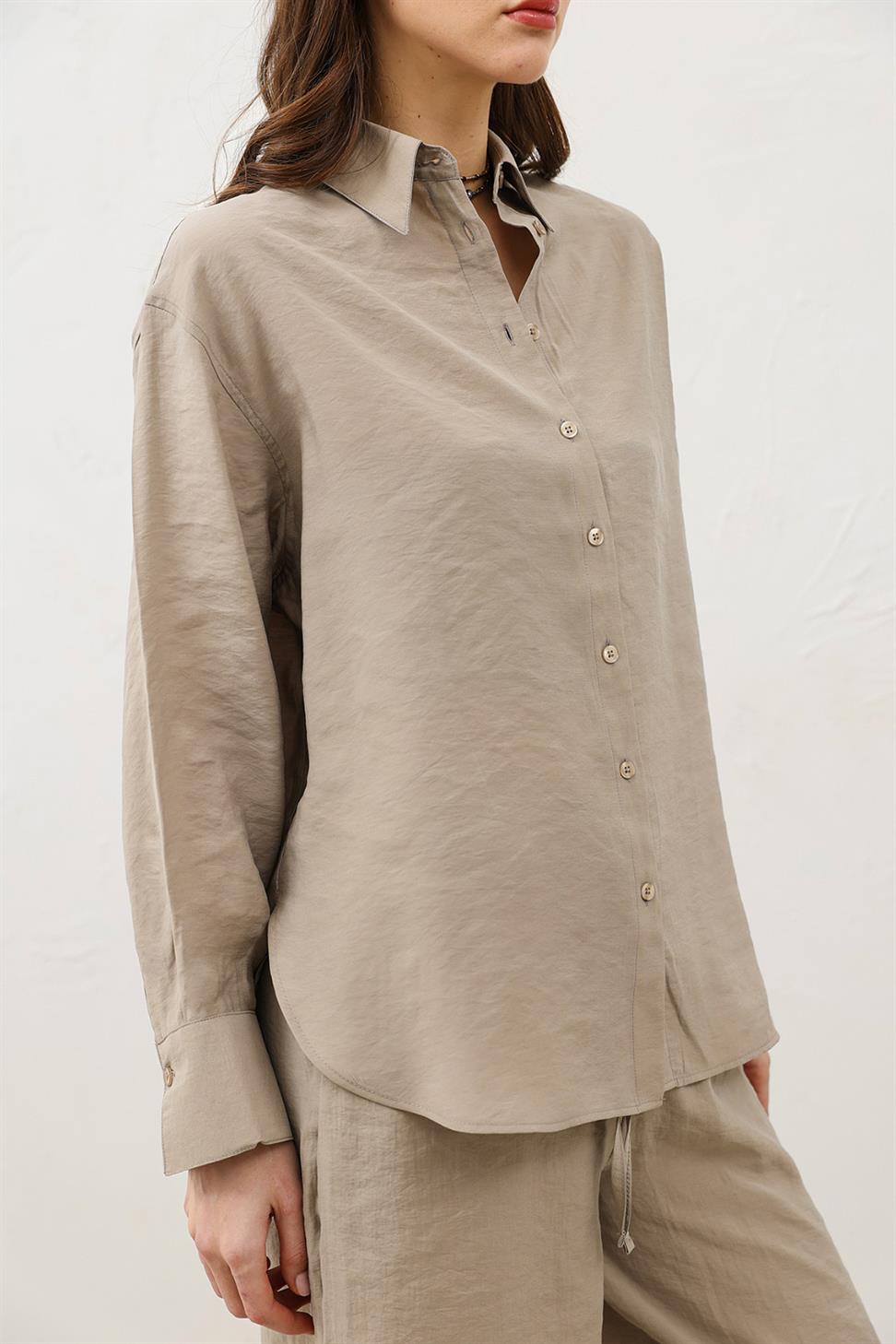 قميص نسائي كبير الحجم