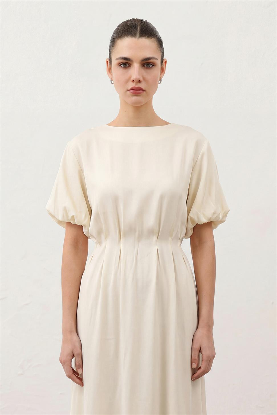 فستان نسائي بأكمام بالون بطول متوسط