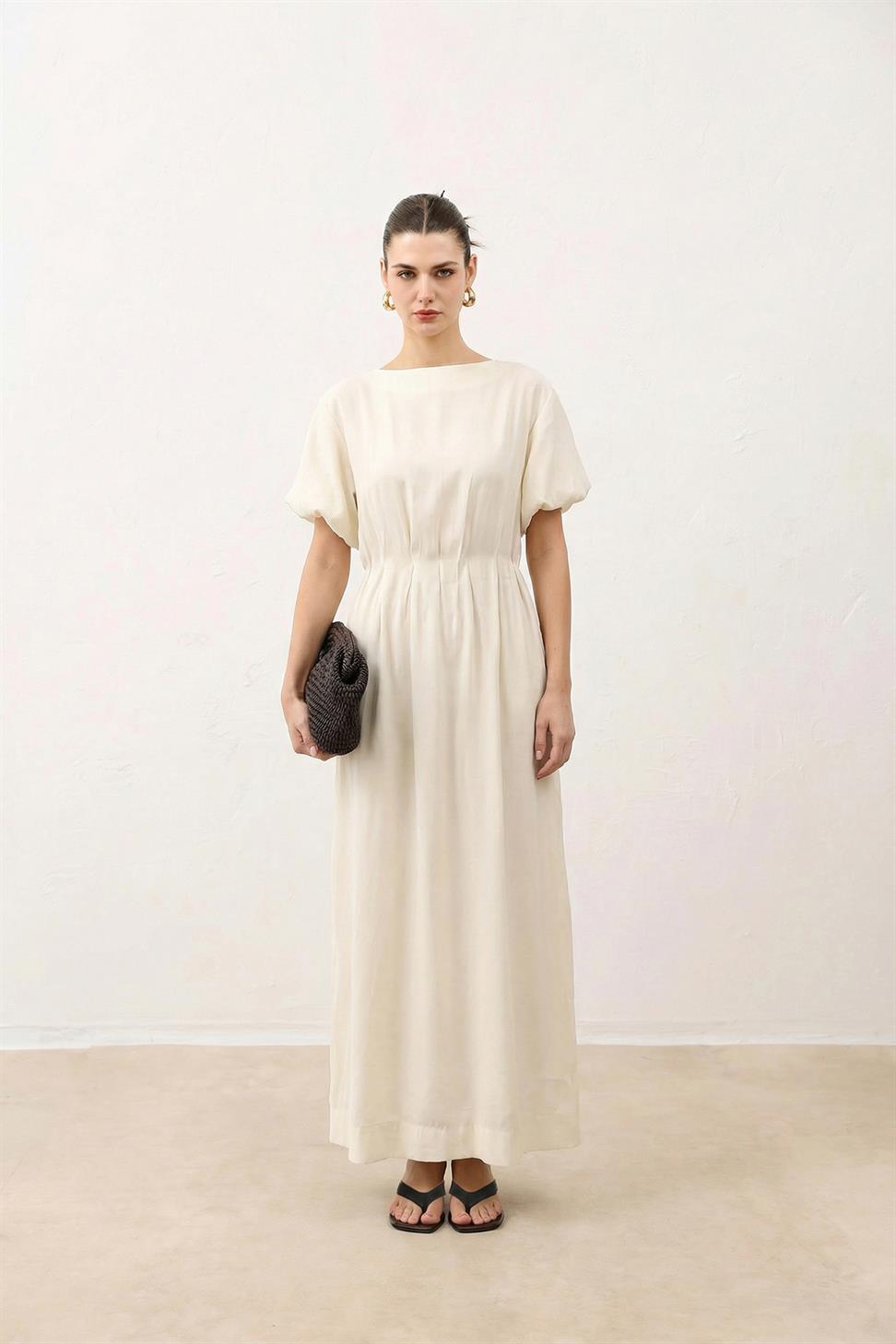 فستان نسائي بأكمام بالون بطول متوسط