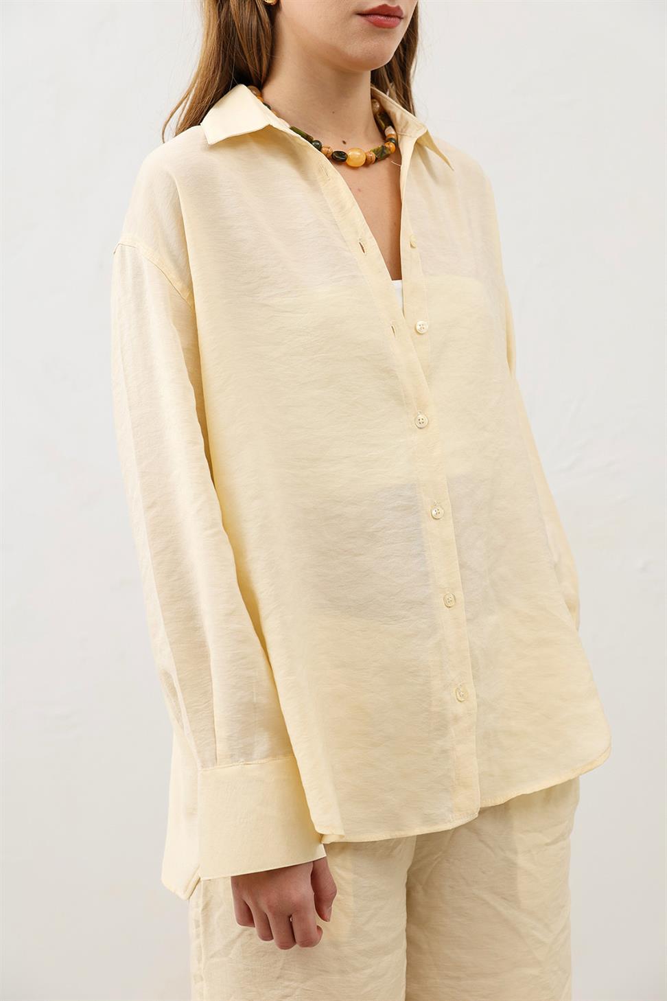 قميص نسائي كبير الحجم