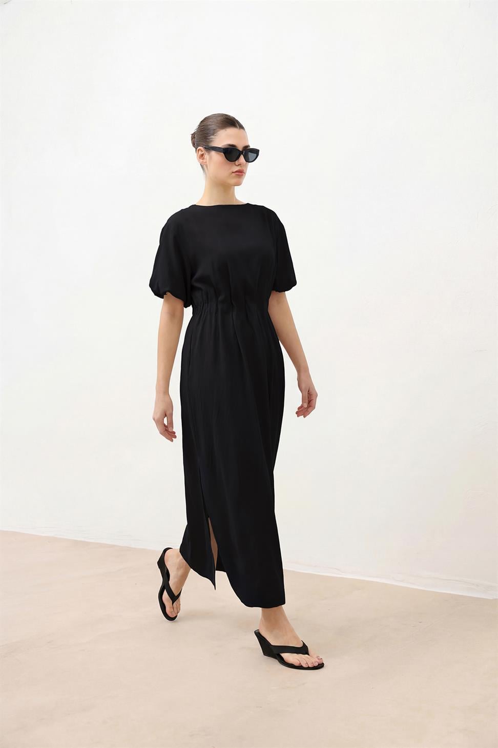 فستان نسائي بأكمام بالون بطول متوسط