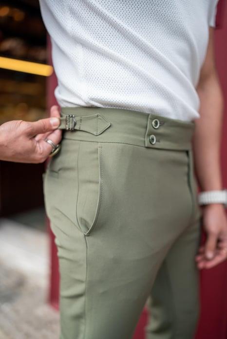 Özel Tasarım Kemer Detaylı Slim Fit Kumaş Pantolon Haki ürünü KUMAŞ PANTOLON kategorisinde sizleri bekliyor.
