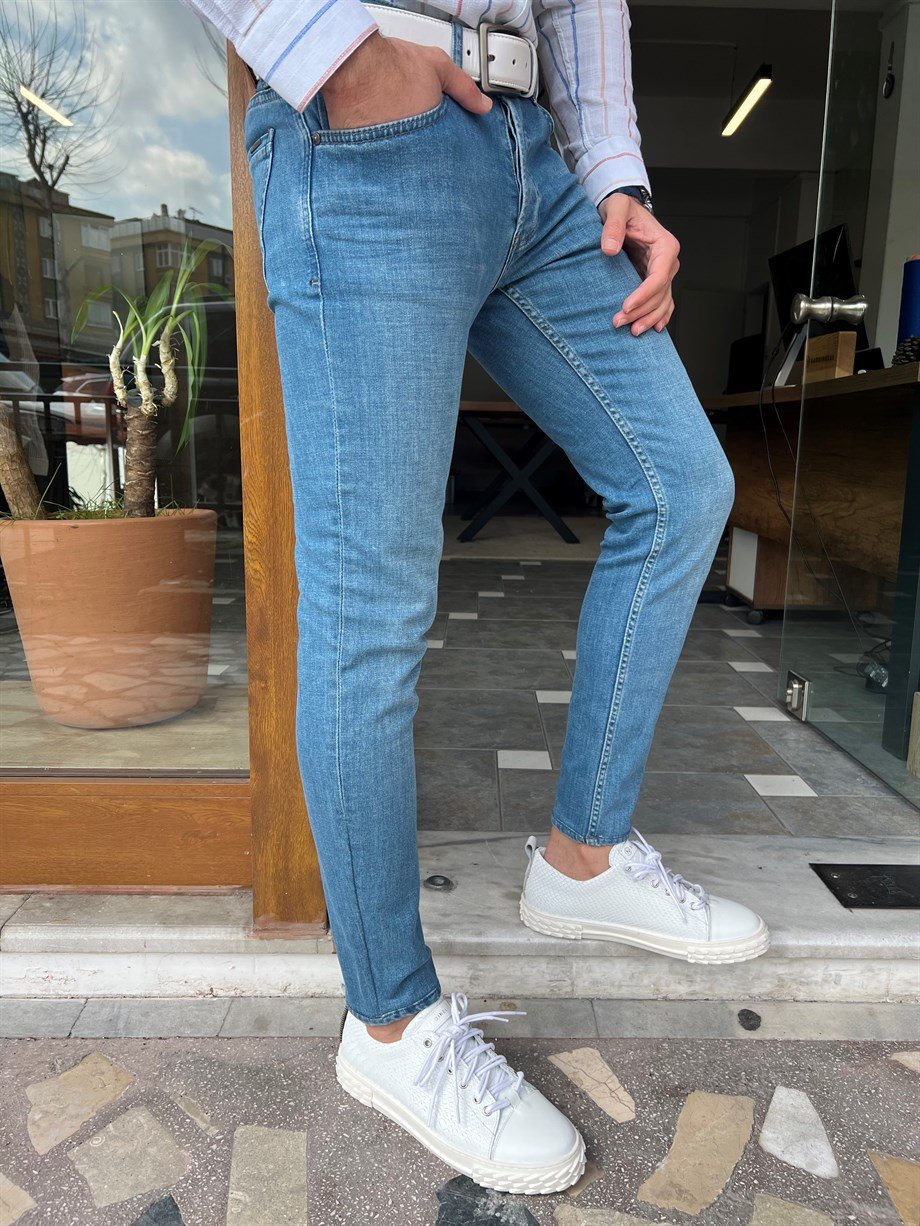 Taşlamalı Slim Fit Kot Pantolon ürünü ALT GİYİM kategorisinde sizleri bekliyor.