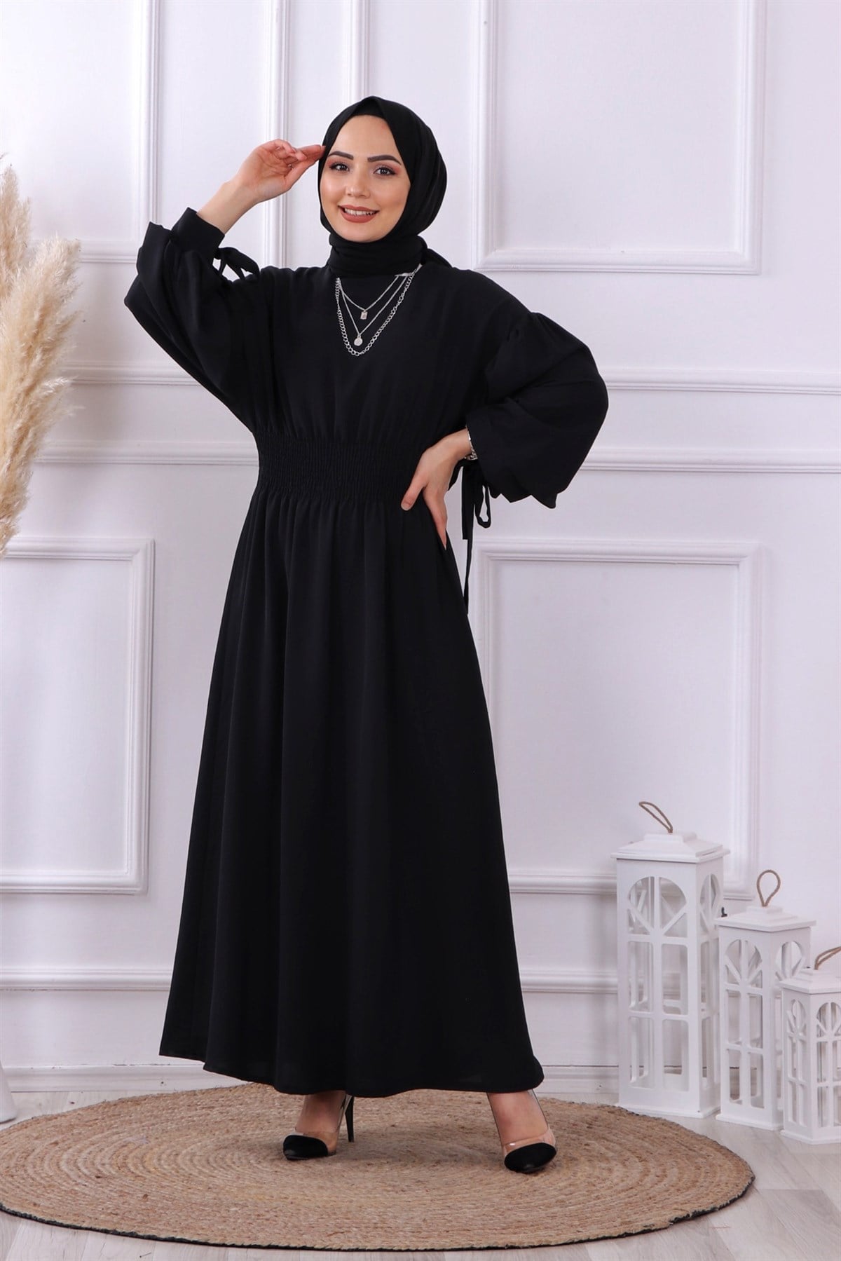 beli lastikli elbise siyah