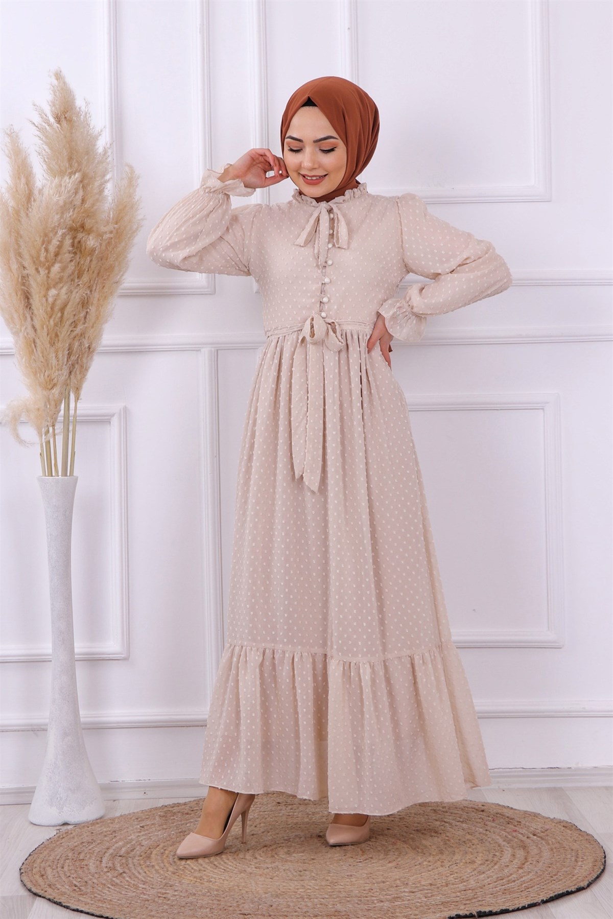 ponponlu elbise taş