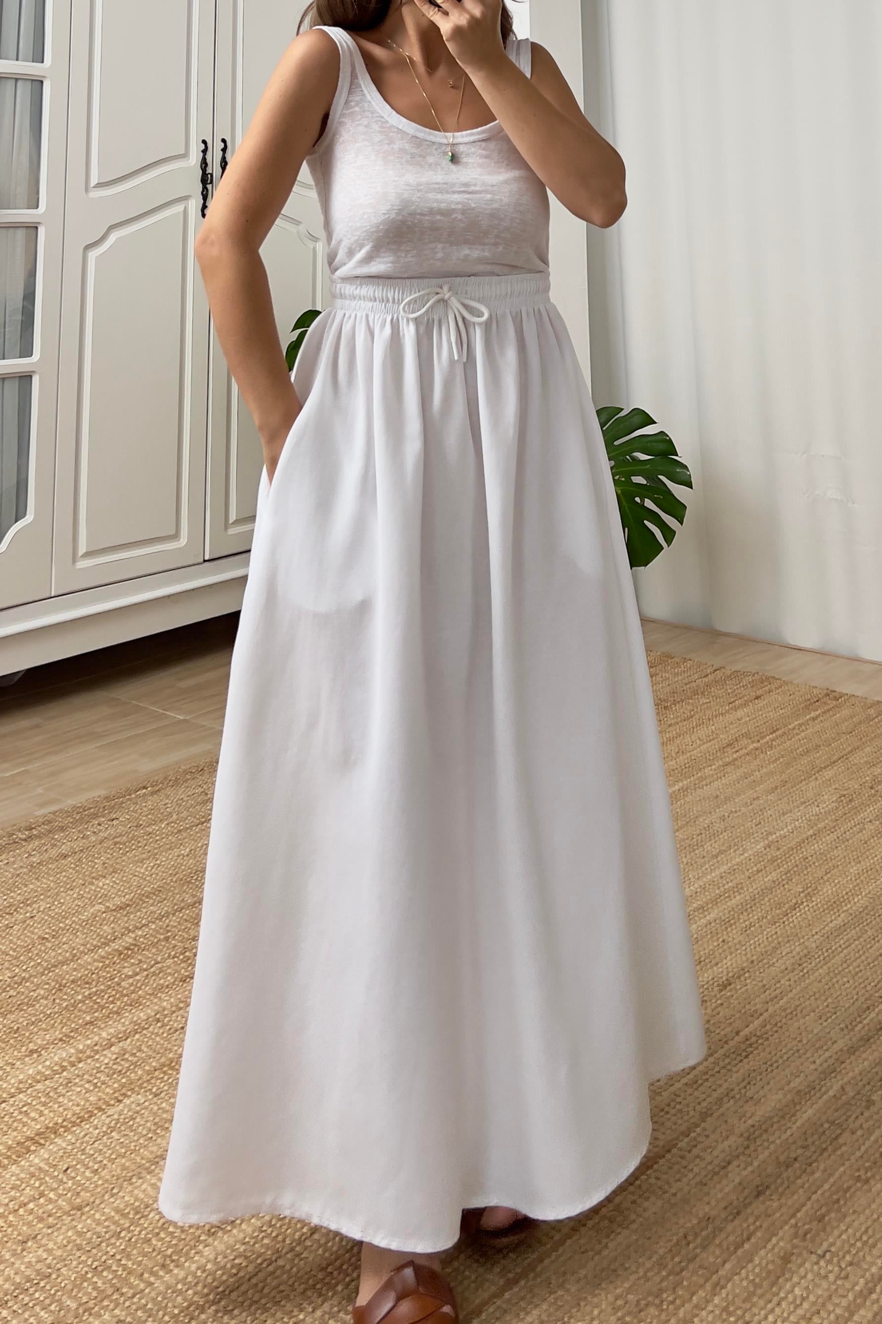 Beyaz Cepli Kloş Keten Etek uygun fiyatlarda www.butikhola.com adresinde