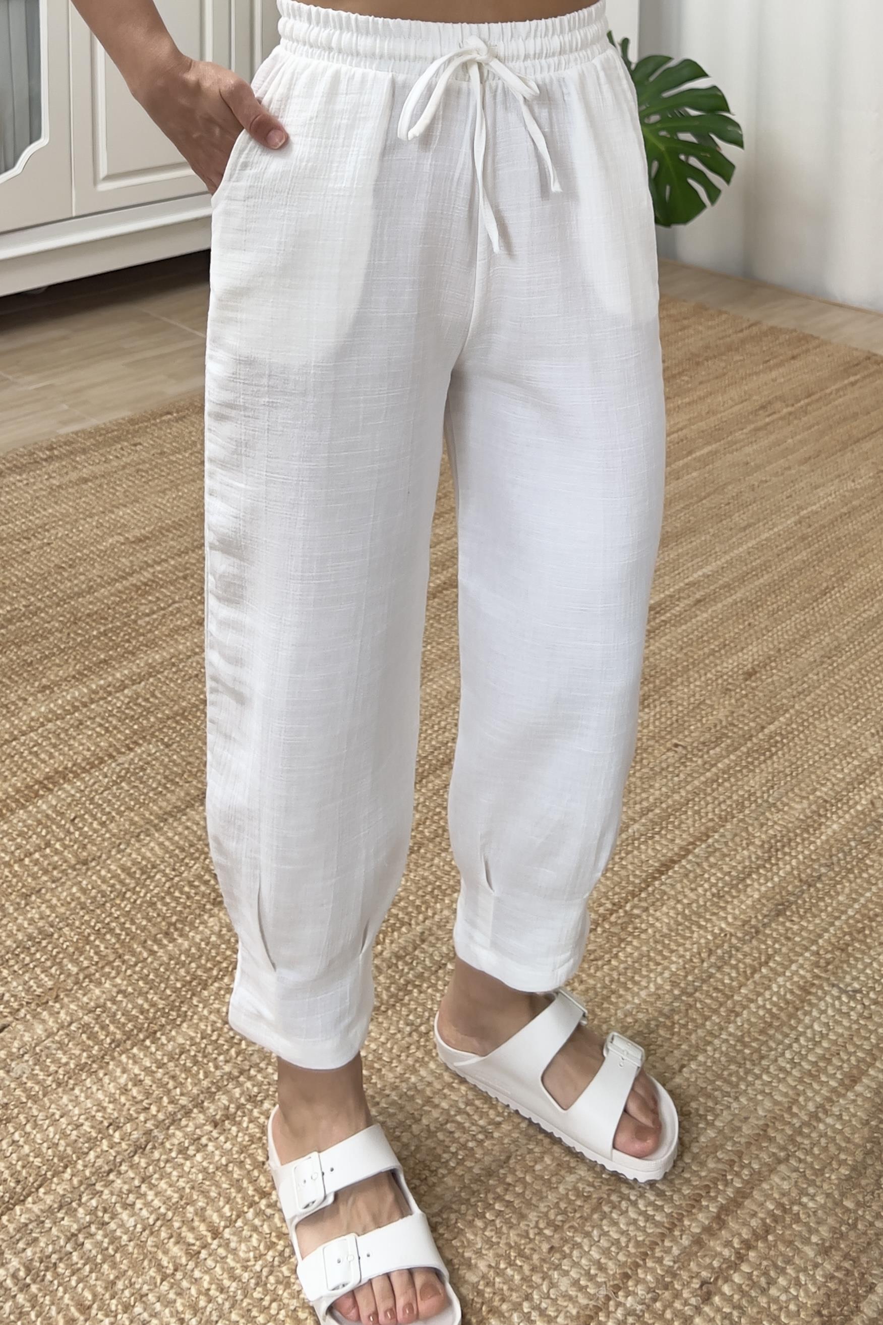 Beyaz Paçası Pileli Müslin Pantolon uygun fiyatlarda www.butikhola.com adresinde