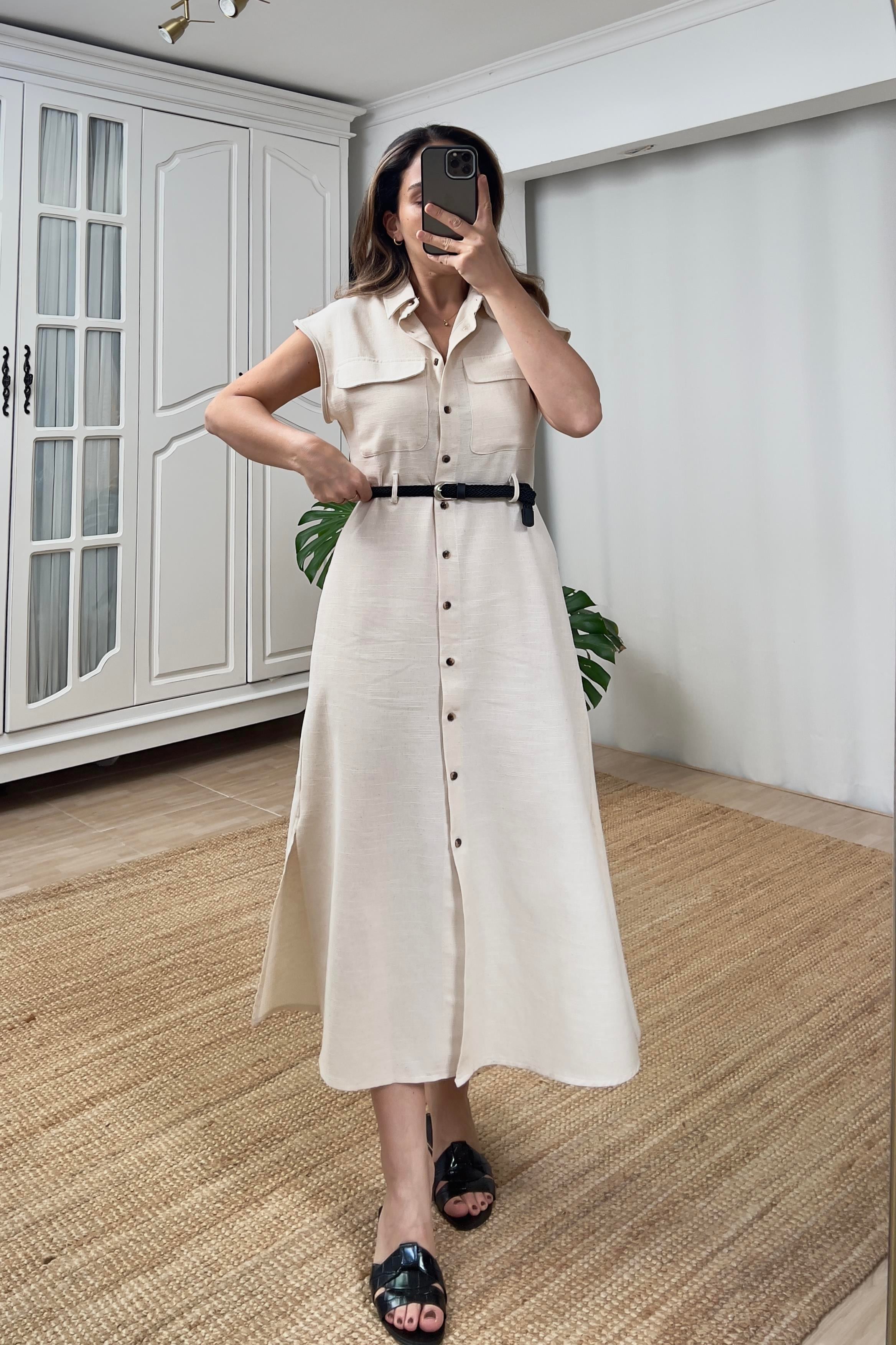 Cepli Ve Kemerli Yırtmaç Detaylı Elbise uygun fiyatlarda www.butikhola.com adresinde