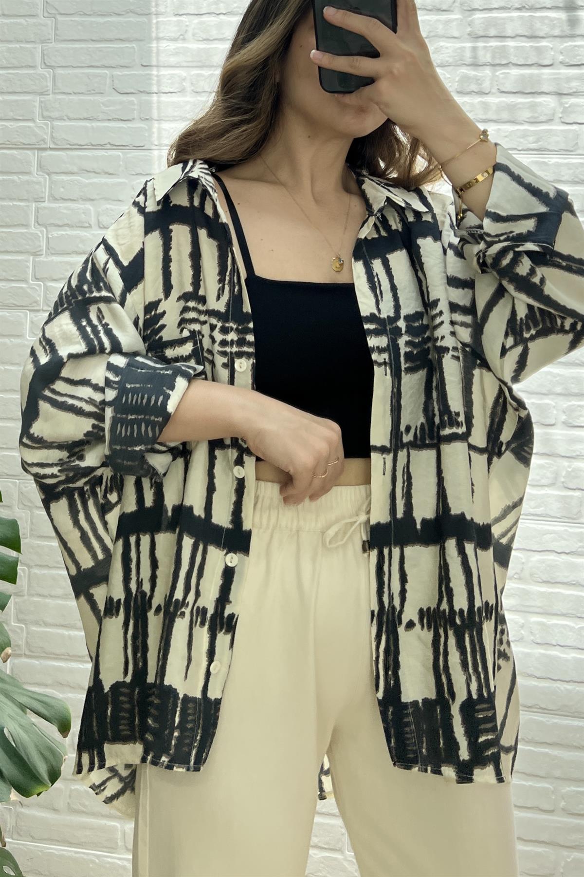 Desenli Dökümlü Gömlek uygun fiyatlarda www.butikhola.com adresinde