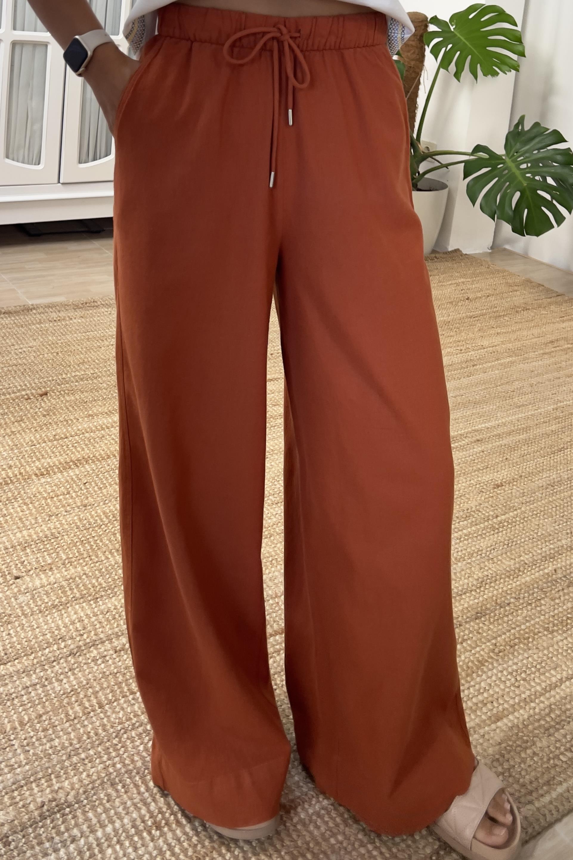 Kiremit Beli Bağcıklı Bol Paça Keten Pantolon uygun fiyatlarda www.butikhola.com adresinde