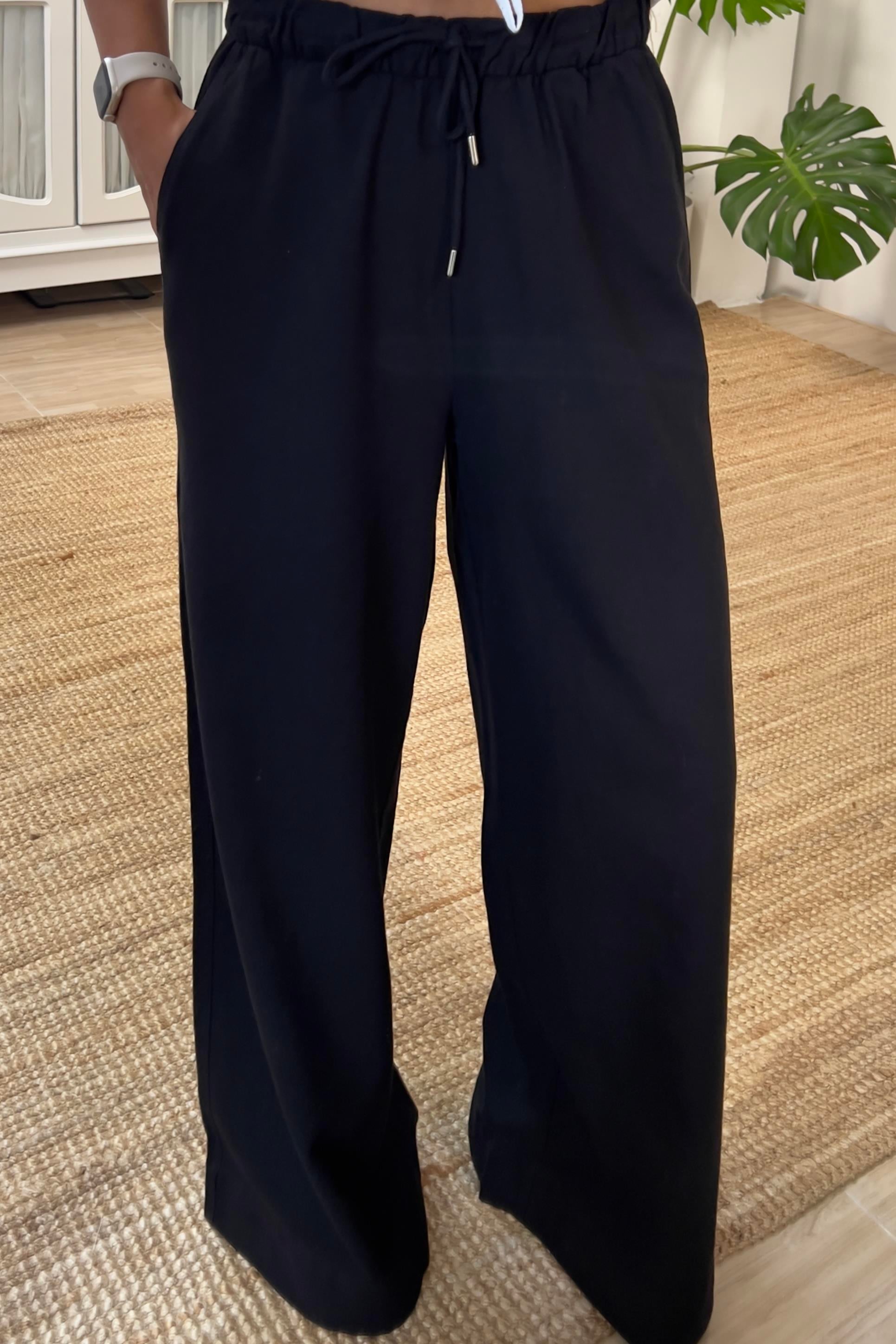 Siyah Beli Bağcıklı Bol Paça Keten Pantolon uygun fiyatlarda www.butikhola.com adresinde