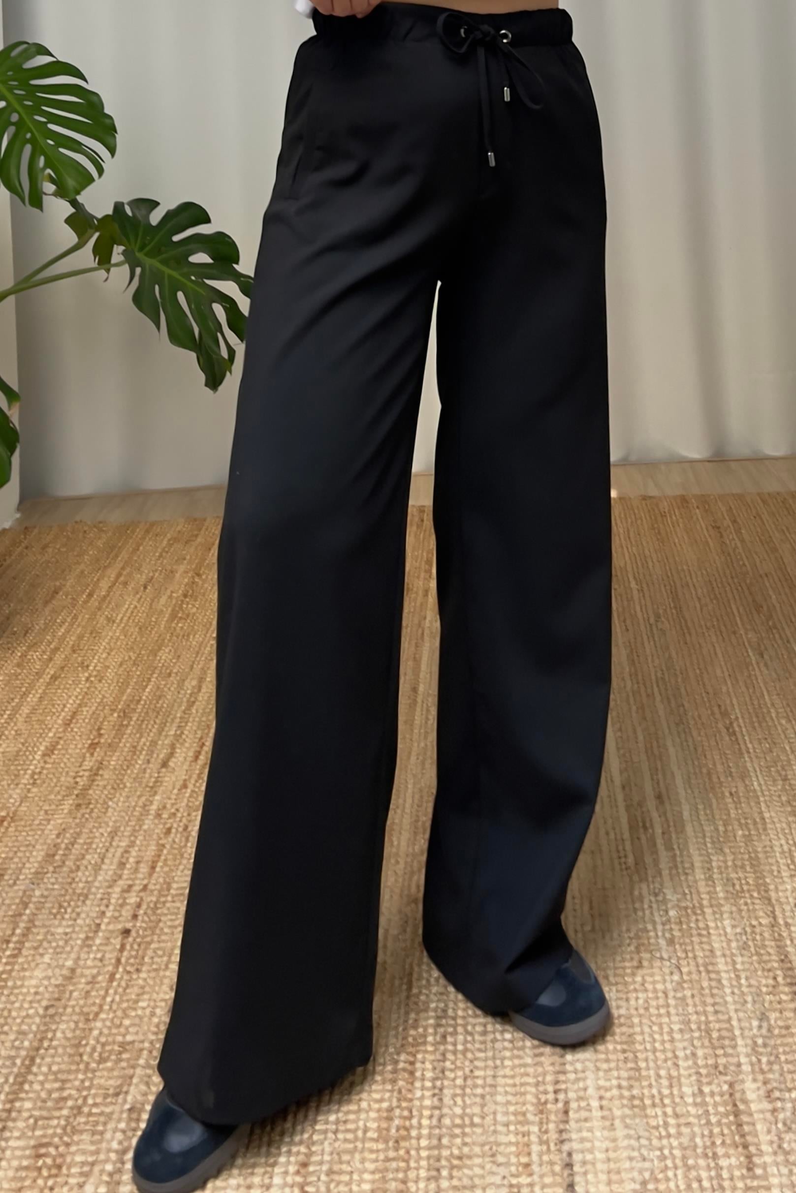 Siyah Beli Elastik Geniş Paça Pantolon uygun fiyatlarda www.butikhola.com adresinde