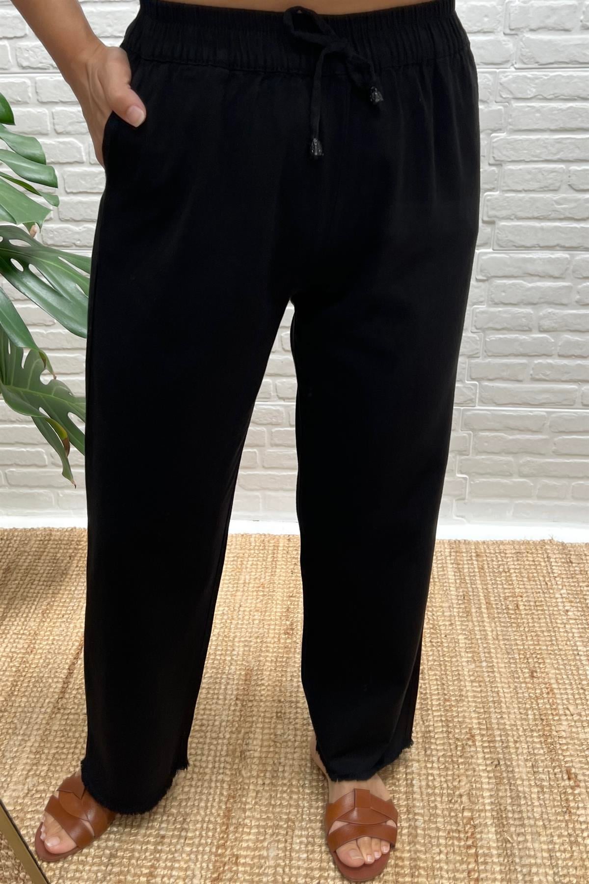Siyah Paçası Püskül Detaylı Rahat Pantolon uygun fiyatlarda www.butikhola.com adresinde