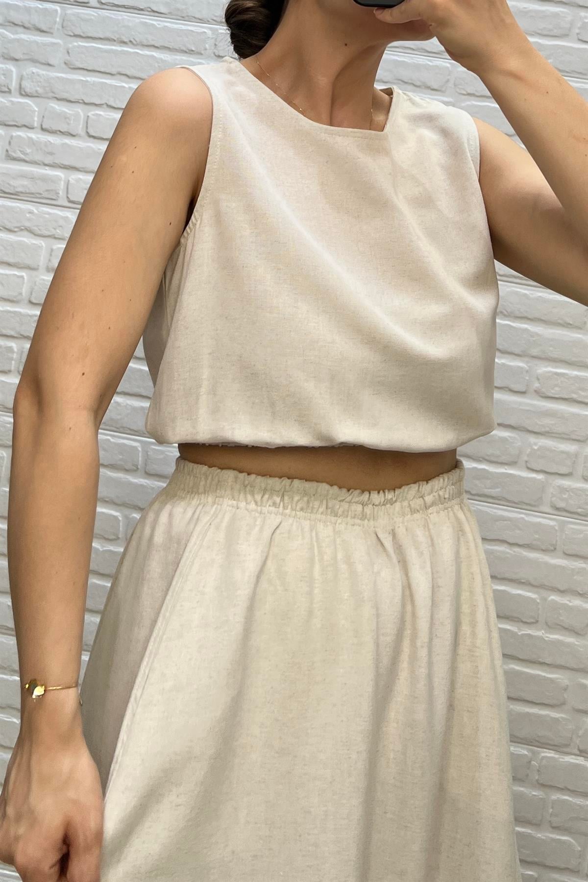 Taş Beli Büzgülü Keten Bluz uygun fiyatlarda www.butikhola.com adresinde
