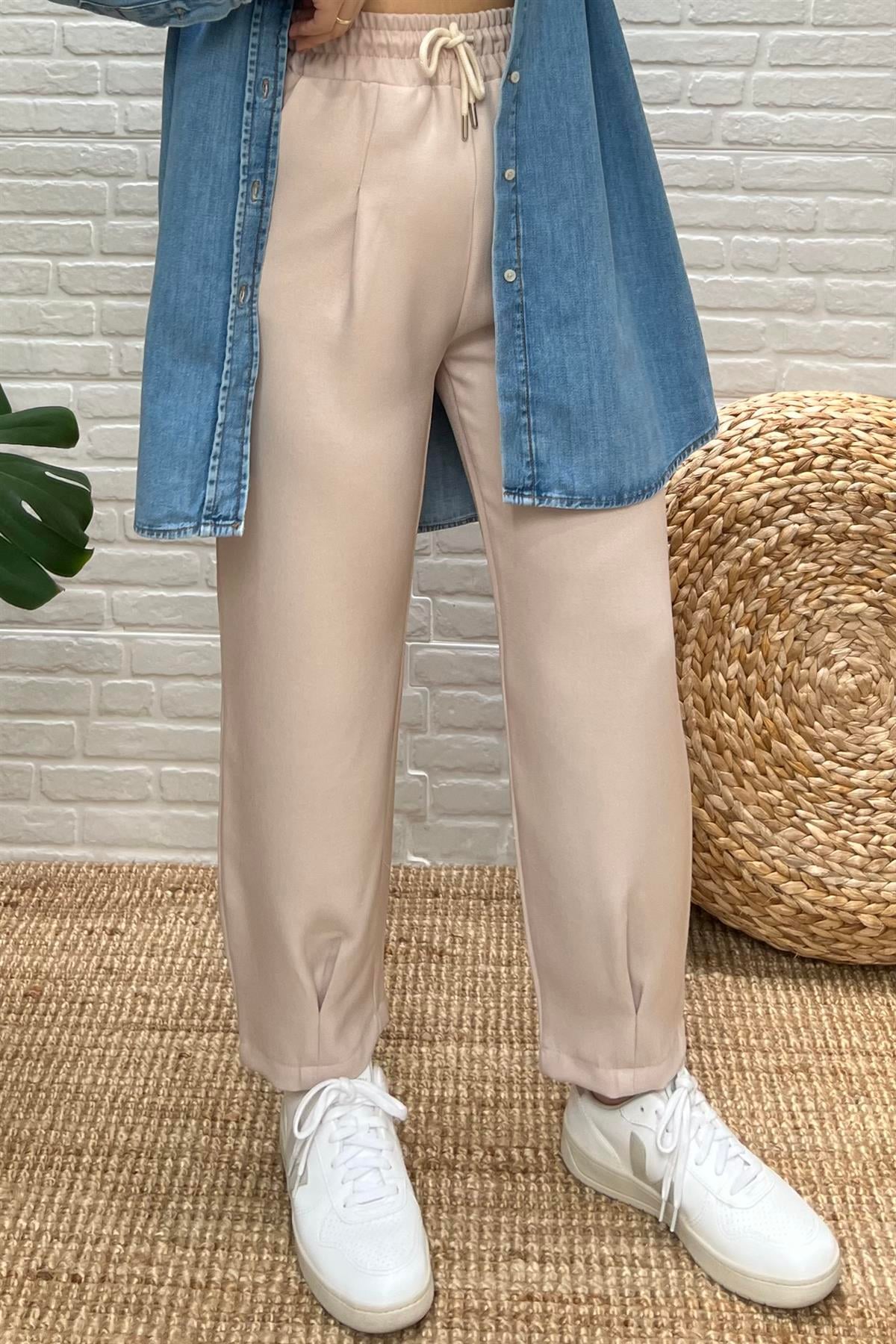 Taş Rengi Beli Lastikli Paçası Pilili Dokulu Pantolon uygun fiyatlarda www.butikhola.com adresinde