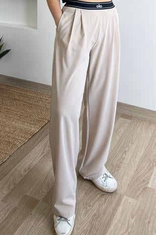 Bej Beli Logo Şeritli Trn Pantolon uygun fiyatlarda www.butikhola.com adresinde