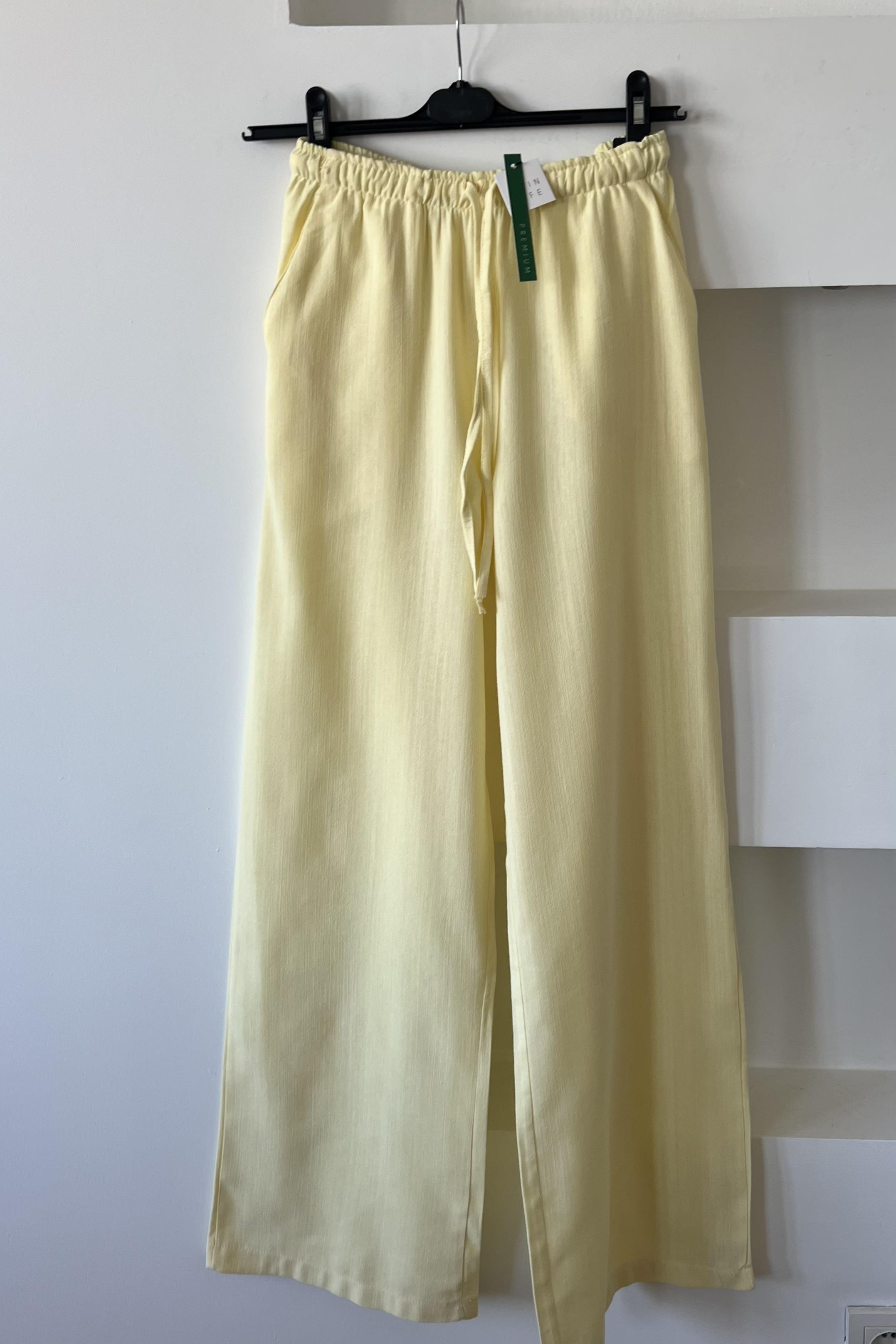Sarı Düz Kesim Keten Pantolon uygun fiyatlarda www.butikhola.com adresinde