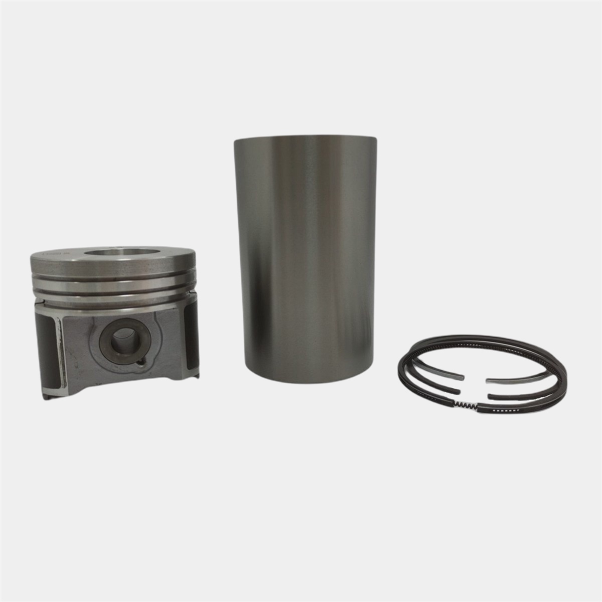 KİT (PİSTON (ALFİNLİ) + SEGMAN SETİ + MOTOR GÖMLEĞİ - SEMİ  FİNİŞ - ÇAP: 87.00 mm): KUBOTA / V2403