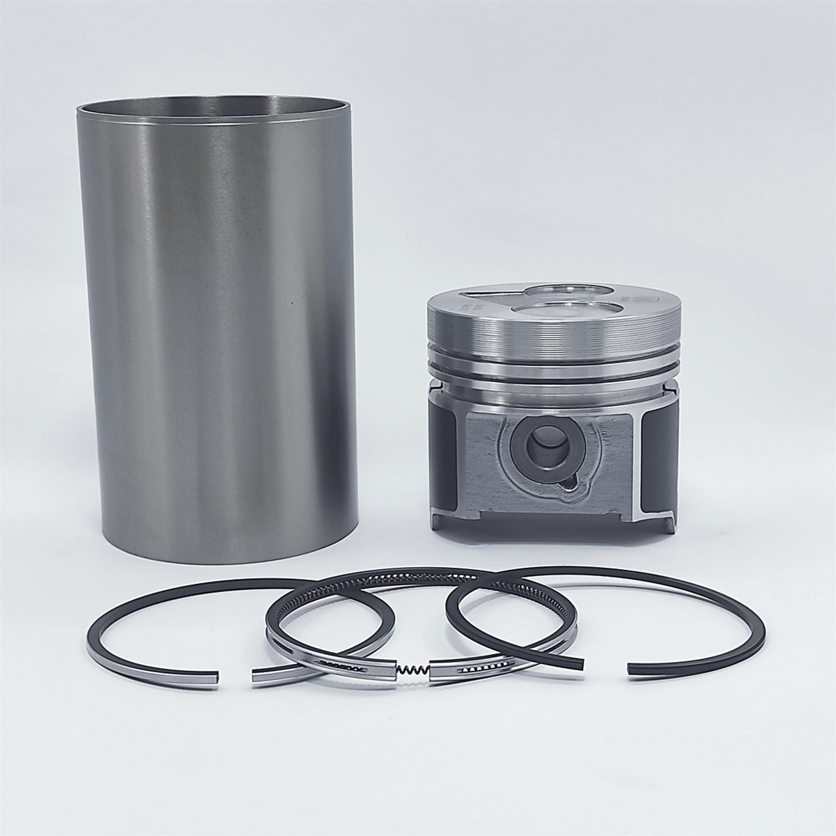 KİT (PİSTON + SEGMAN SETİ + MOTOR GÖMLEĞİ - SEMİ  FİNİŞ - ÇAP: 87.00 mm): KUBOTA / D1803-M / V2203-M