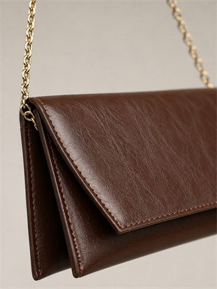 Deri Görünümlü Zincir Askılı Kadın El ve Omuz Çantası – Şık Portföy Clutch Kahverengi