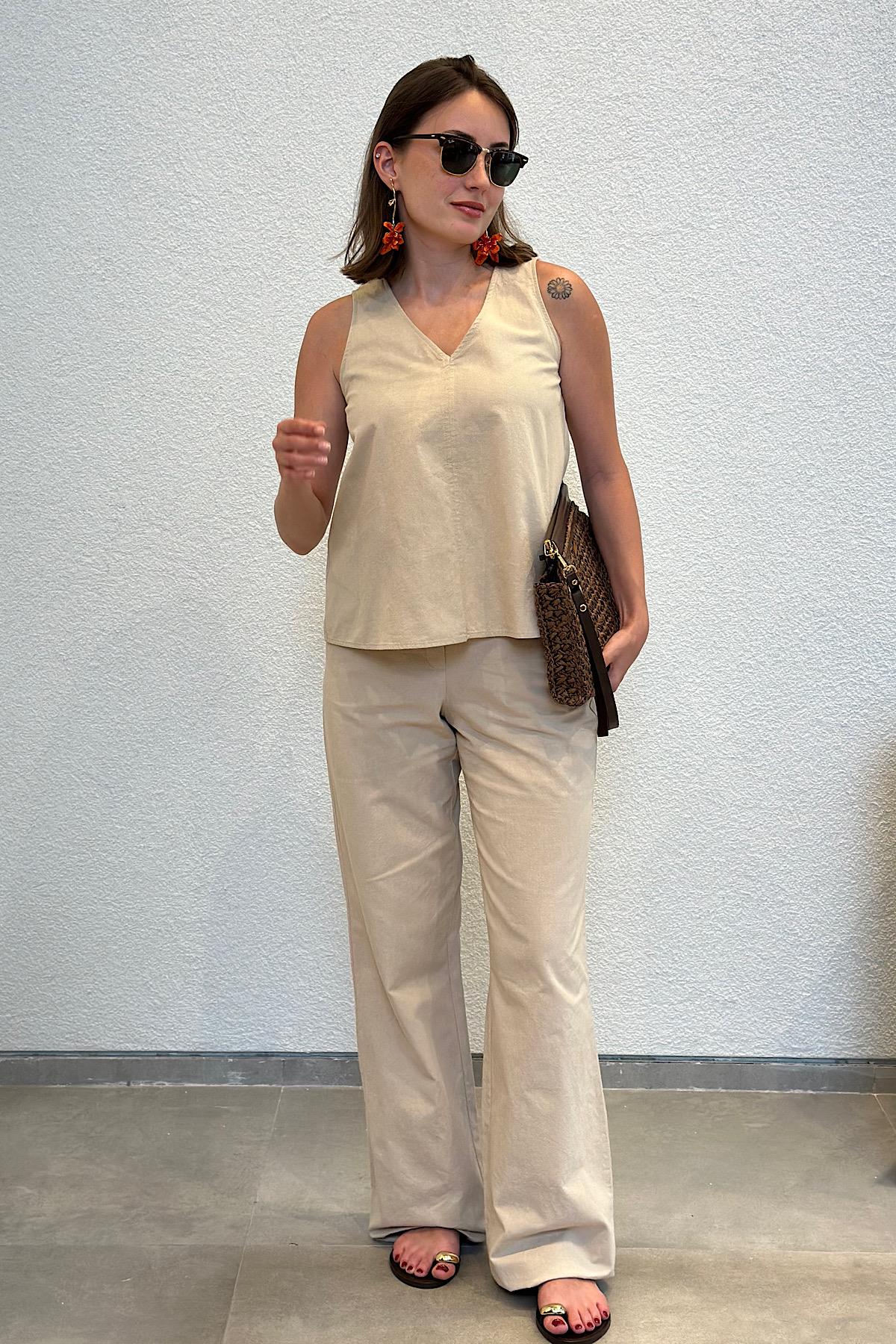 Keten Yaka Detaylı  Premium Sıfır Kol Bluz